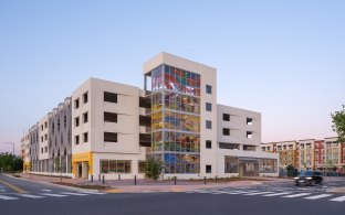 Exterior view of the parking structure in the daytime.
