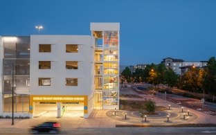 View of the parking garage entrance at nighttime