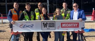People holding beam at Arizona Western College