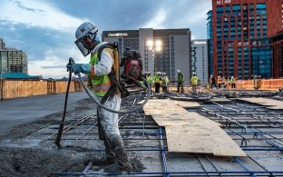Group of people working on a concrete pour