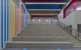 Stairway with colorful wall and ceiling panels at Buena Vista High School