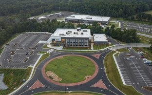 Exterior aerial view of the Carroll Campus building and landscaping. 