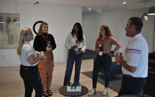 Group of people gathered and talking