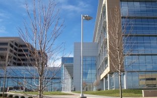 Edward Jones South Campus building exterior, walkways, landscape and light pole