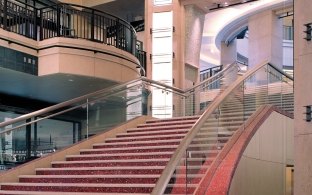 Inside stairs in shopping area.