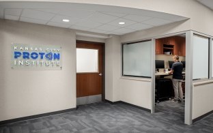 A person inside of an office at KC Proton Institute.