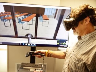Person using virtual reality headset.