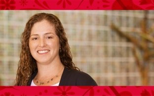 Kelly Coogan's headshot with a red banner around it
