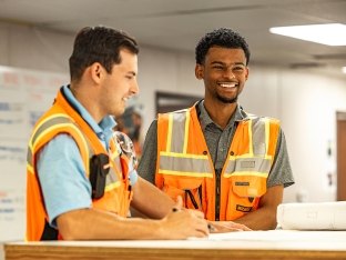 Two people working together