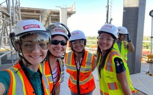 Group of people taking a selfie on a jobsite