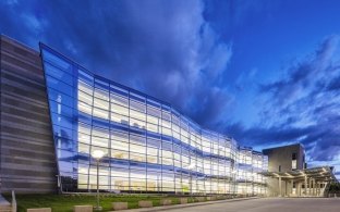 The well-lit and modern-looking VA Hospital in Omaha, NE.