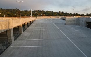 Upward incline of the parking garage.
